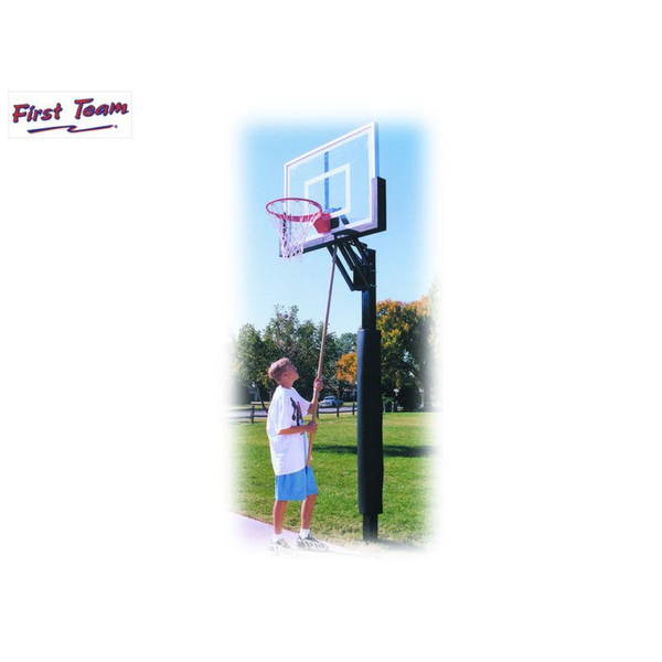 First Team Champ In Ground Adjustable Basketball Goal backboard being cleaned by a kid-First Team-Game Room Shop