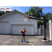 First Team Force Pro In Ground Adjustable Basketball Goal with kid posing-First Team-Game Room Shop