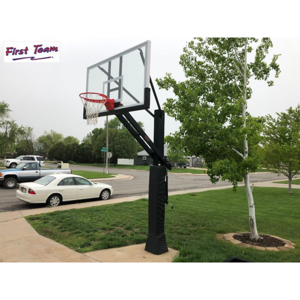 First Team Stainless Olympian In Ground Adjustable Basketball Goal angled view near the curb-First Team-Game Room Shop